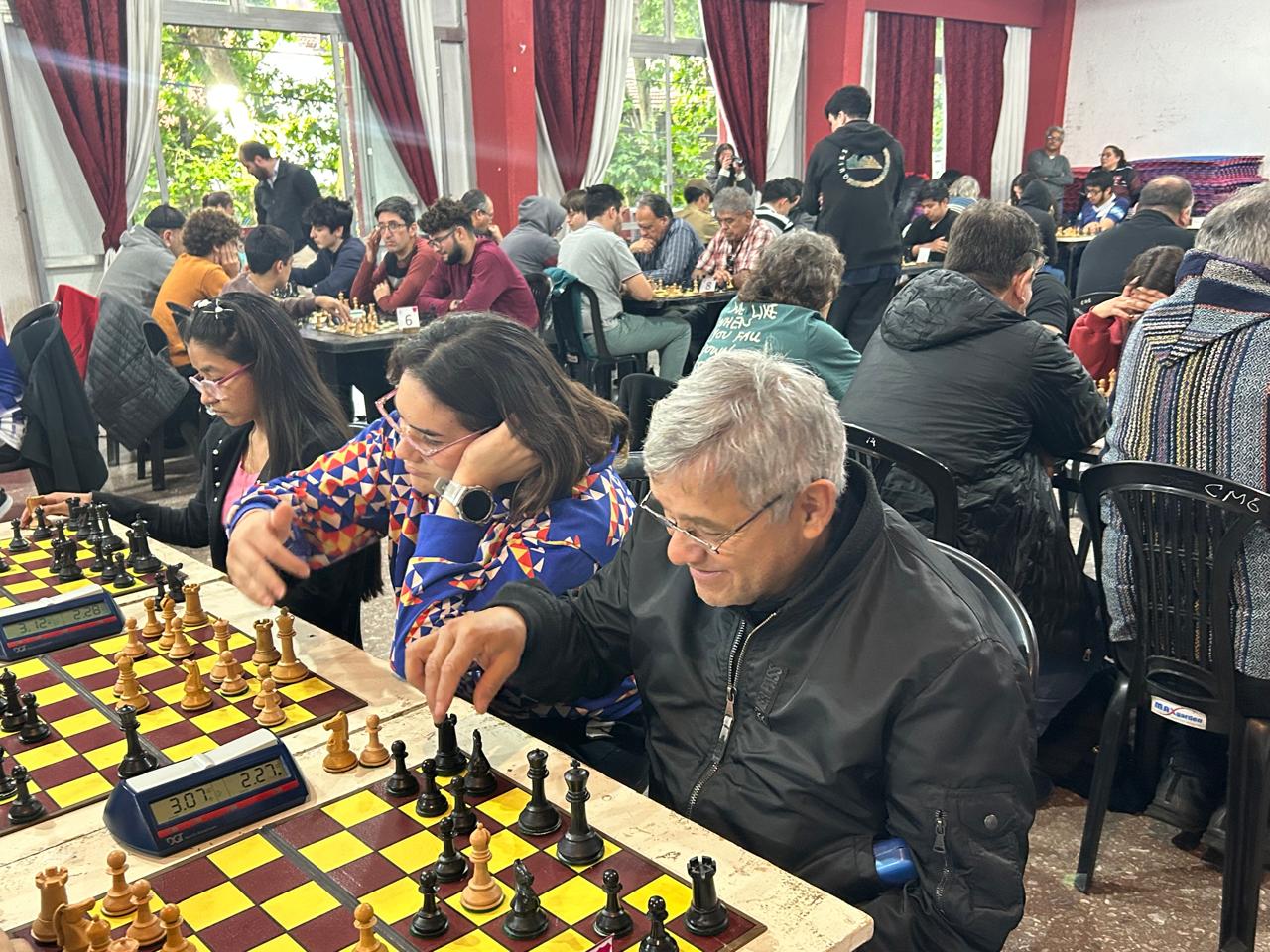 Equipo "Claypole B": Eva López, Marianela Ramírez Michelín y el bicampeón de Tercera Categoría, Ángel Palma